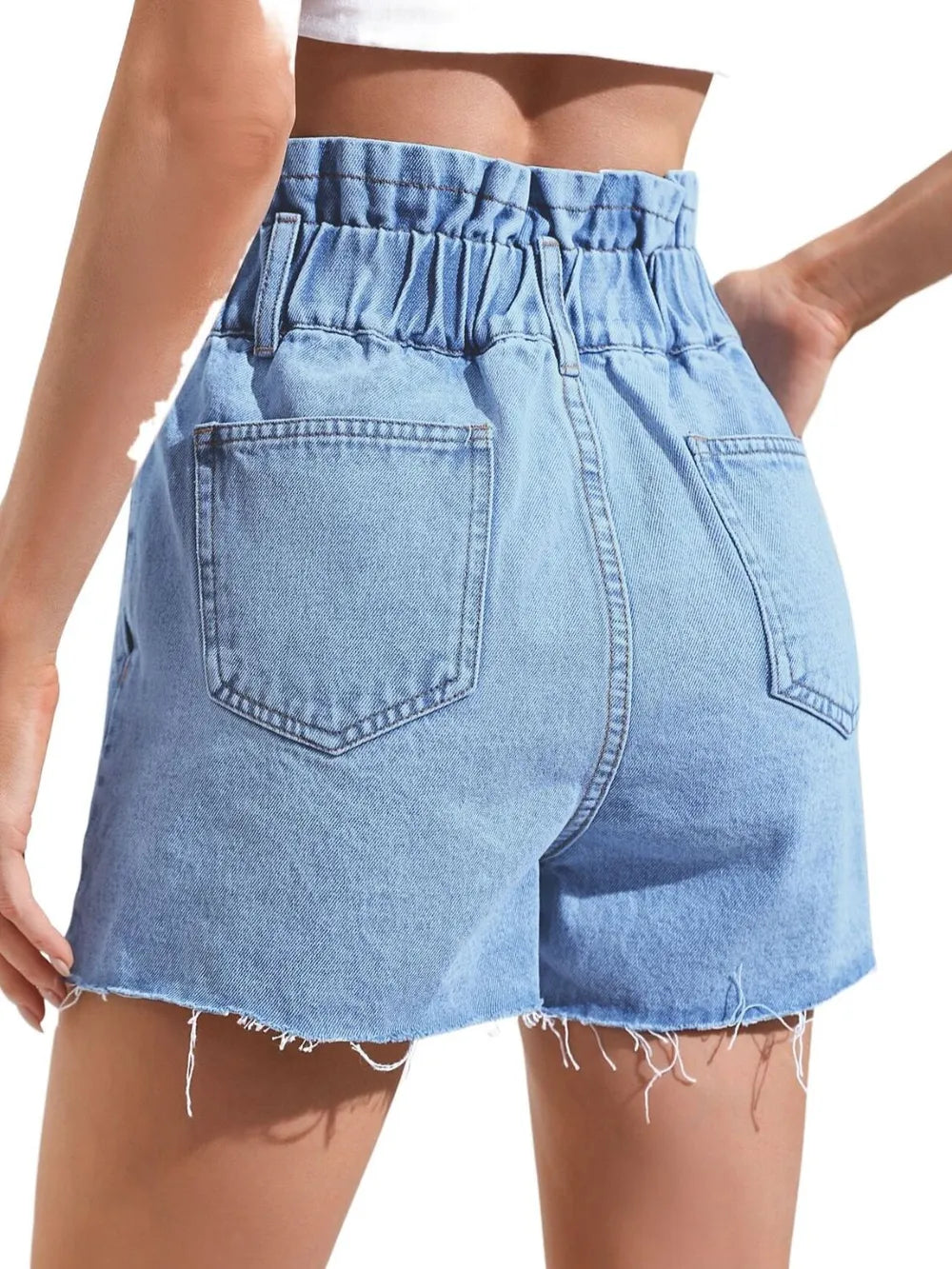 Fashionable high waisted loose and slimming denim shorts with frayed edges